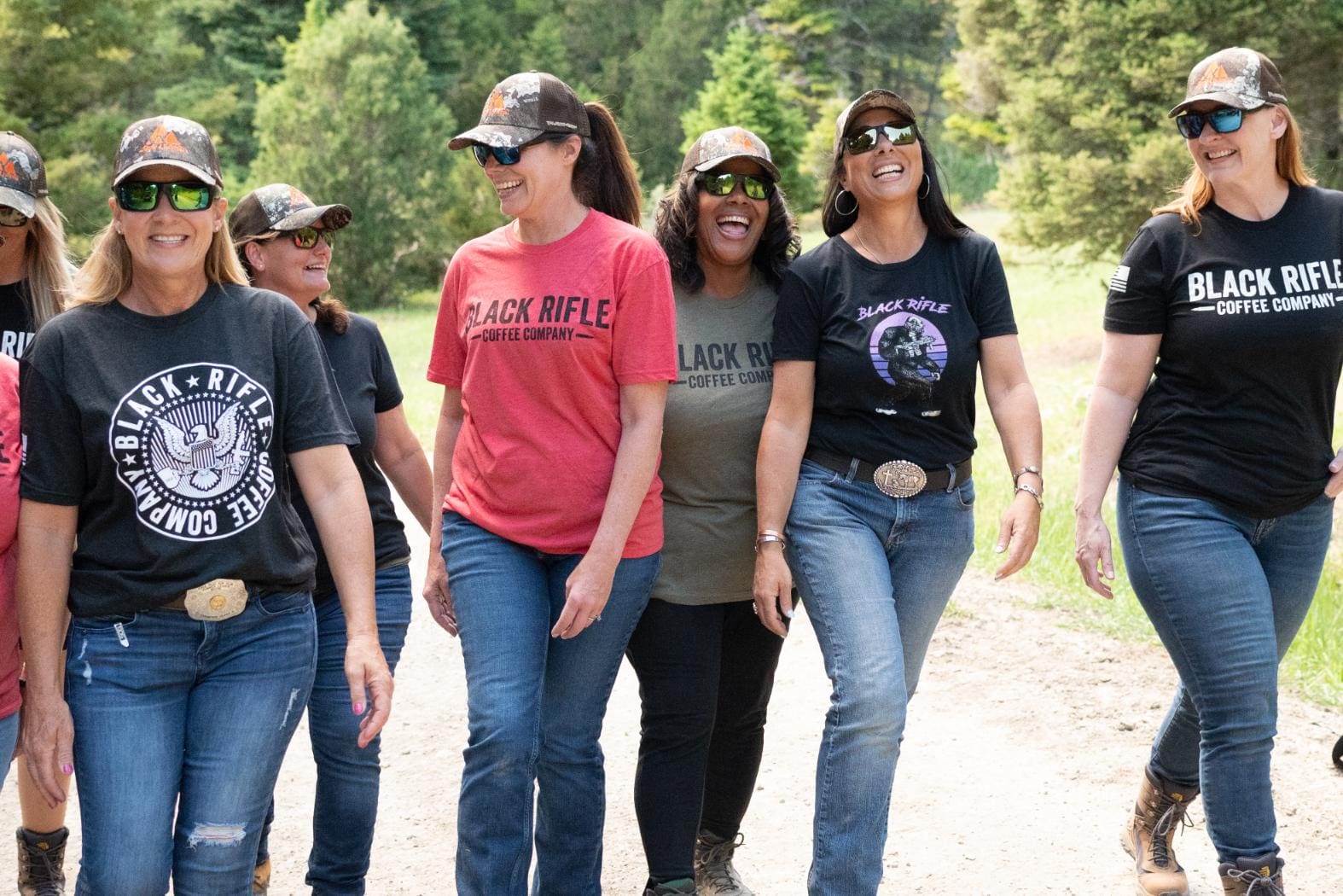 Friends out for a walk with Magpul sun glasses, Black Rifle Coffee, Safe LivinG and LaCrosse