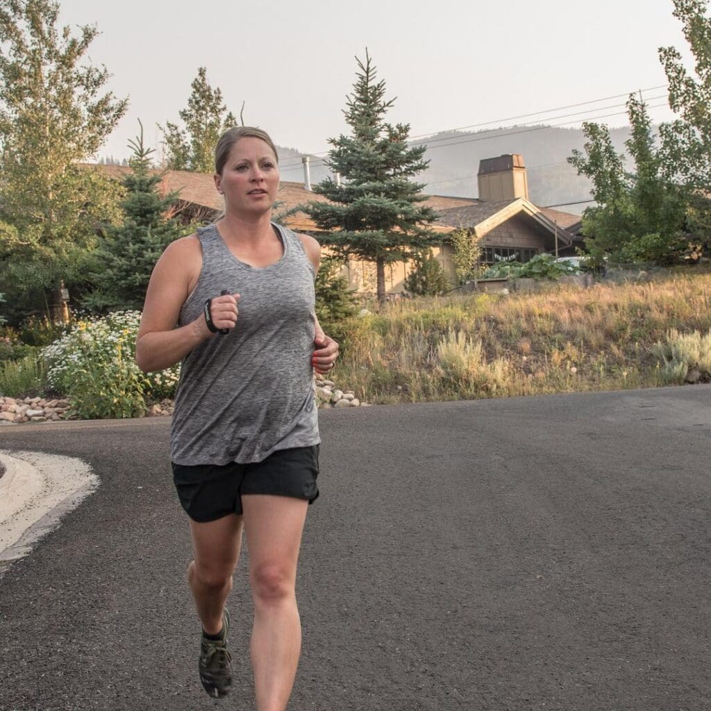 a woman running with Sabre Pepper Spray